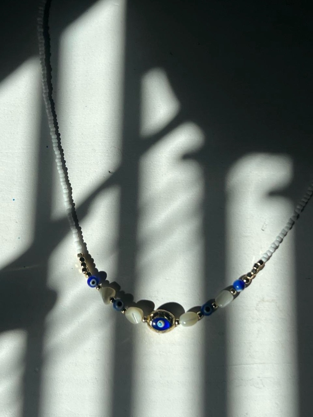 Beaded Evil Eye Necklace in Blue and White